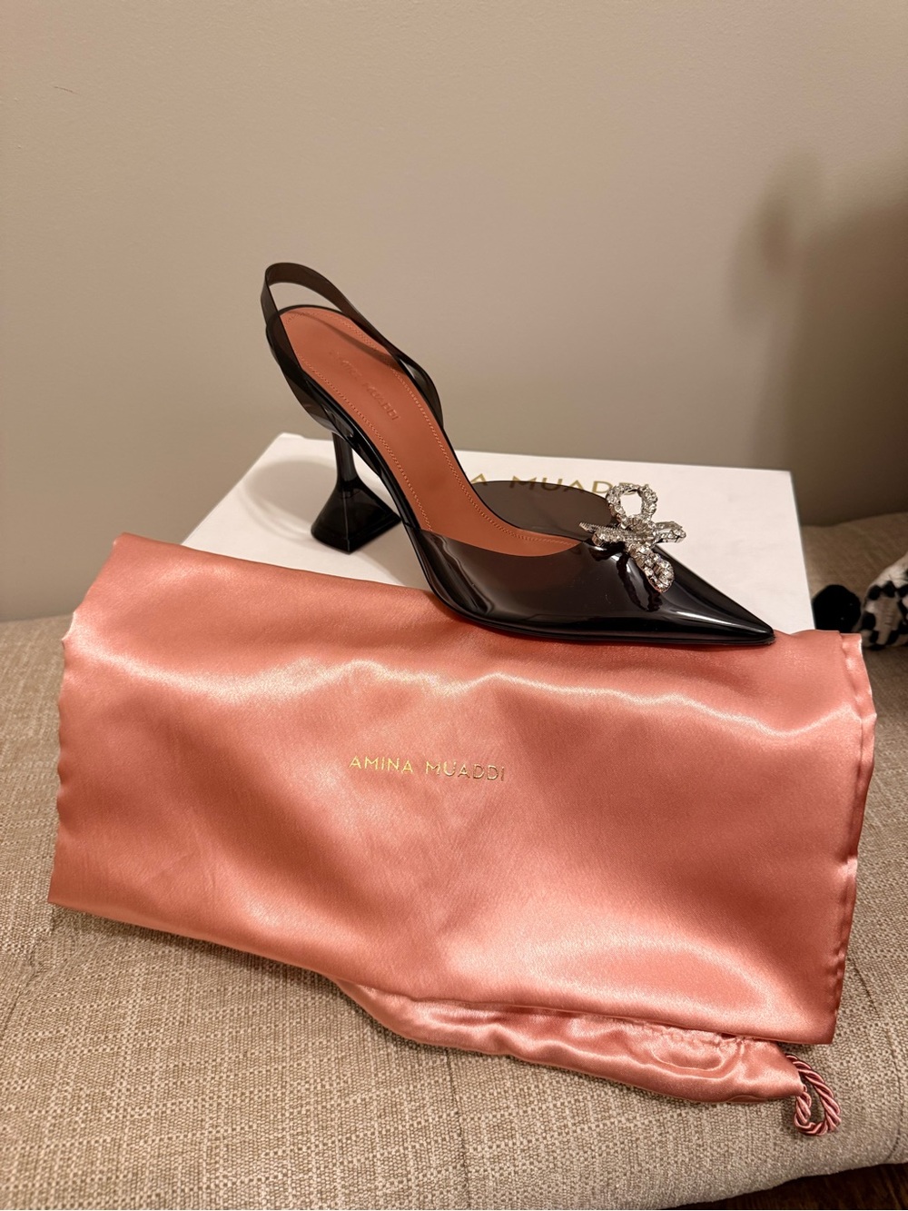 Amina Muaddi Black Patent Slingback Pump with Crystal Bow